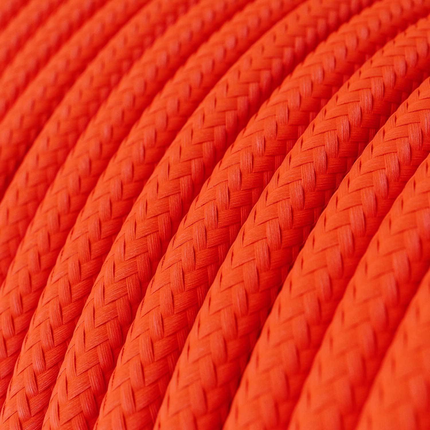 Lámpara colgante de silicona colorida con cable textil.