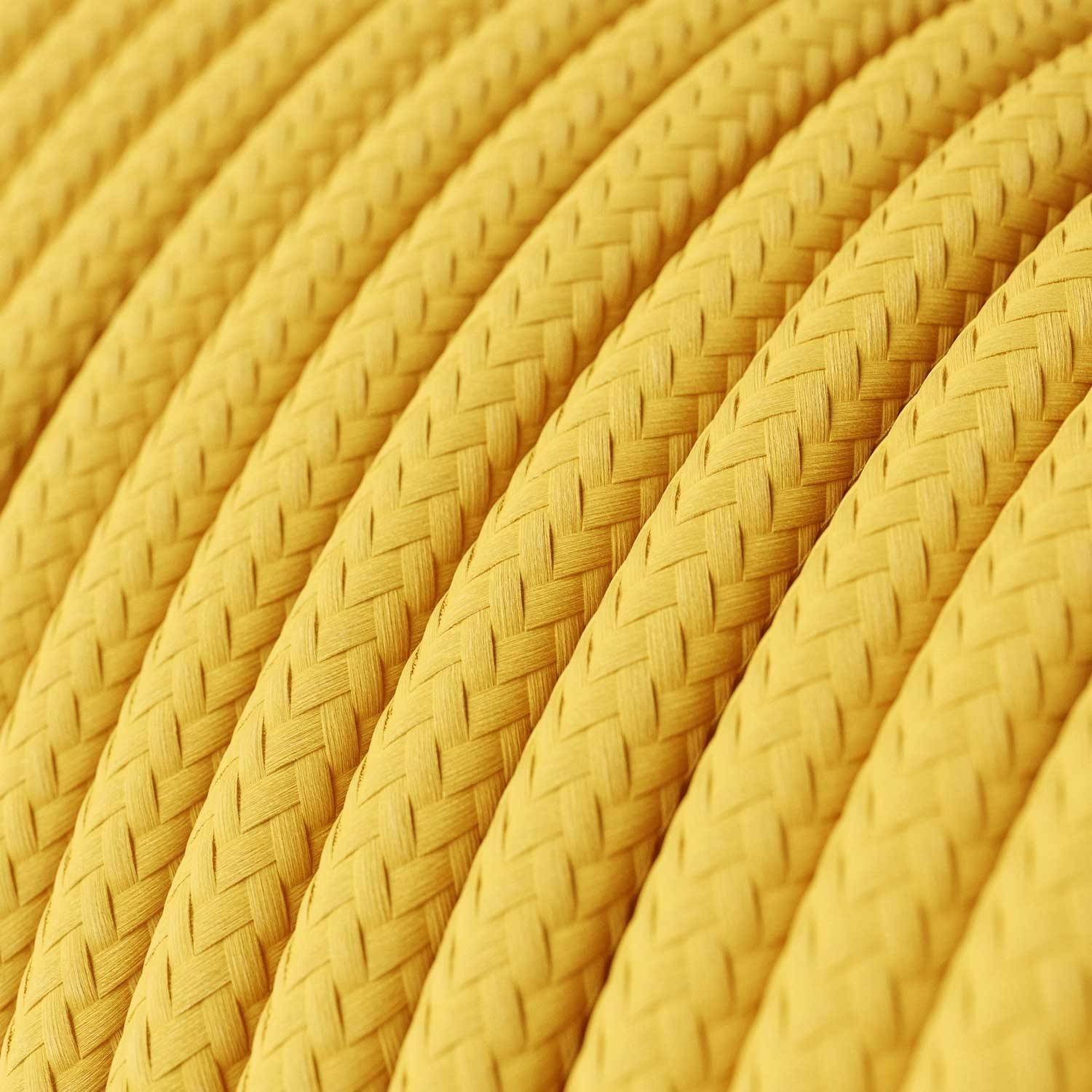 Lámpara colgante de silicona colorida con cable textil.