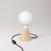 Table lamp with base in alder wood and porcelain effect bulb