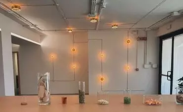 Ghost light bulb installation lights up the Alysi boutique in Rome